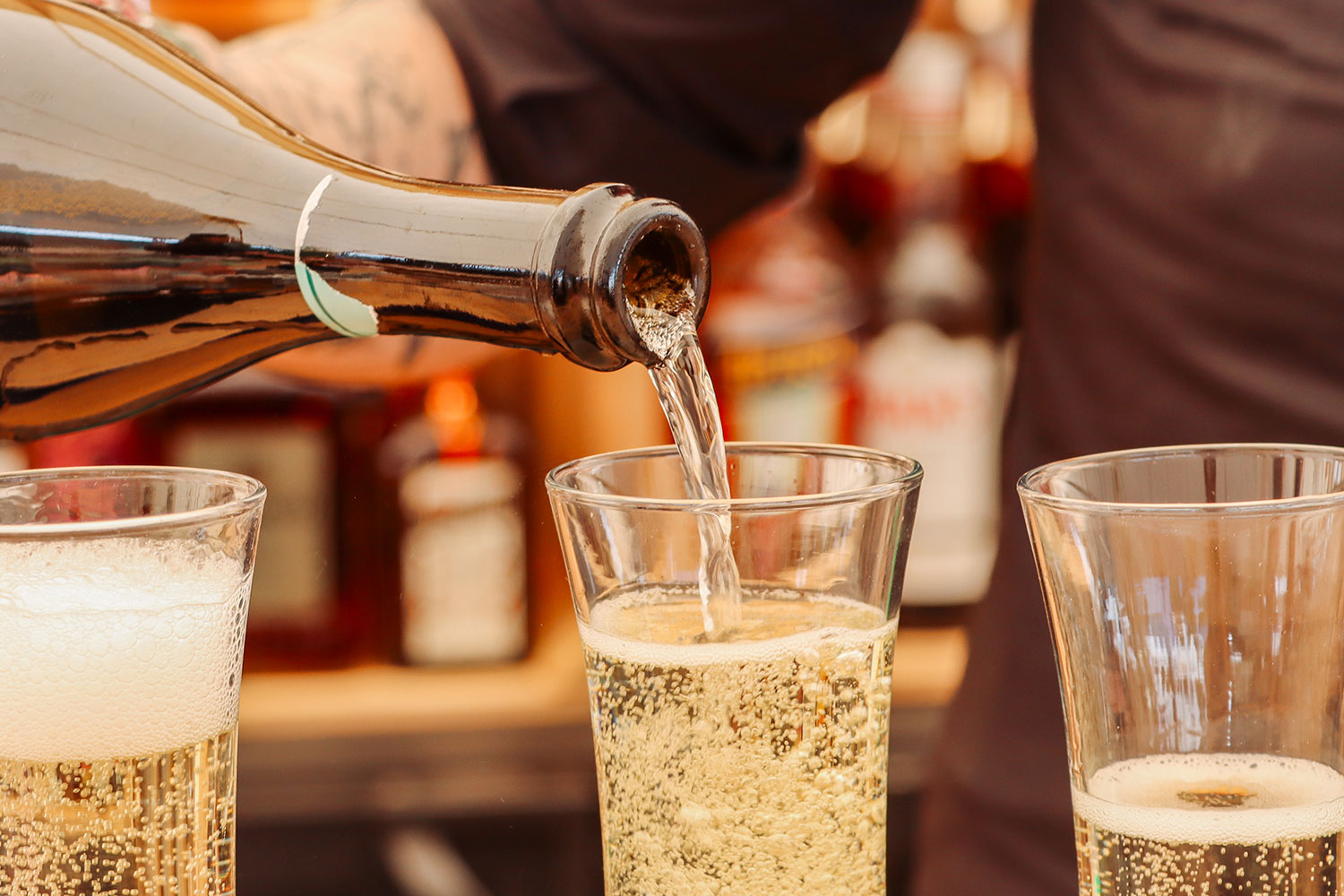 Live parties pouring champagne